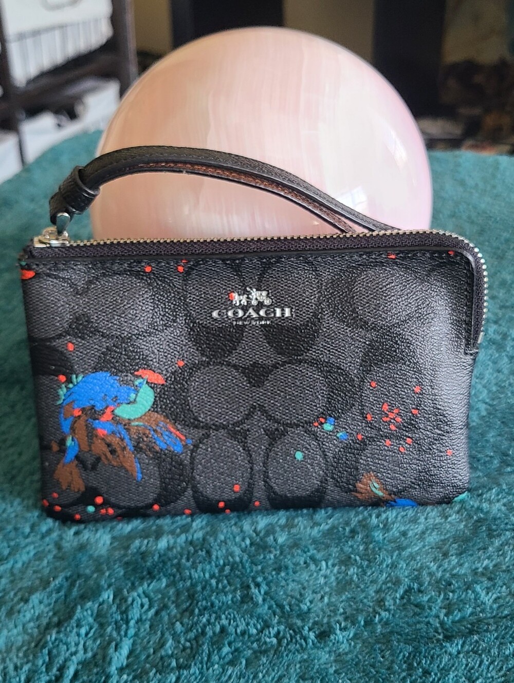 COACH Black Signature Canvas Wristlet with Multicolor Splash Bird Print